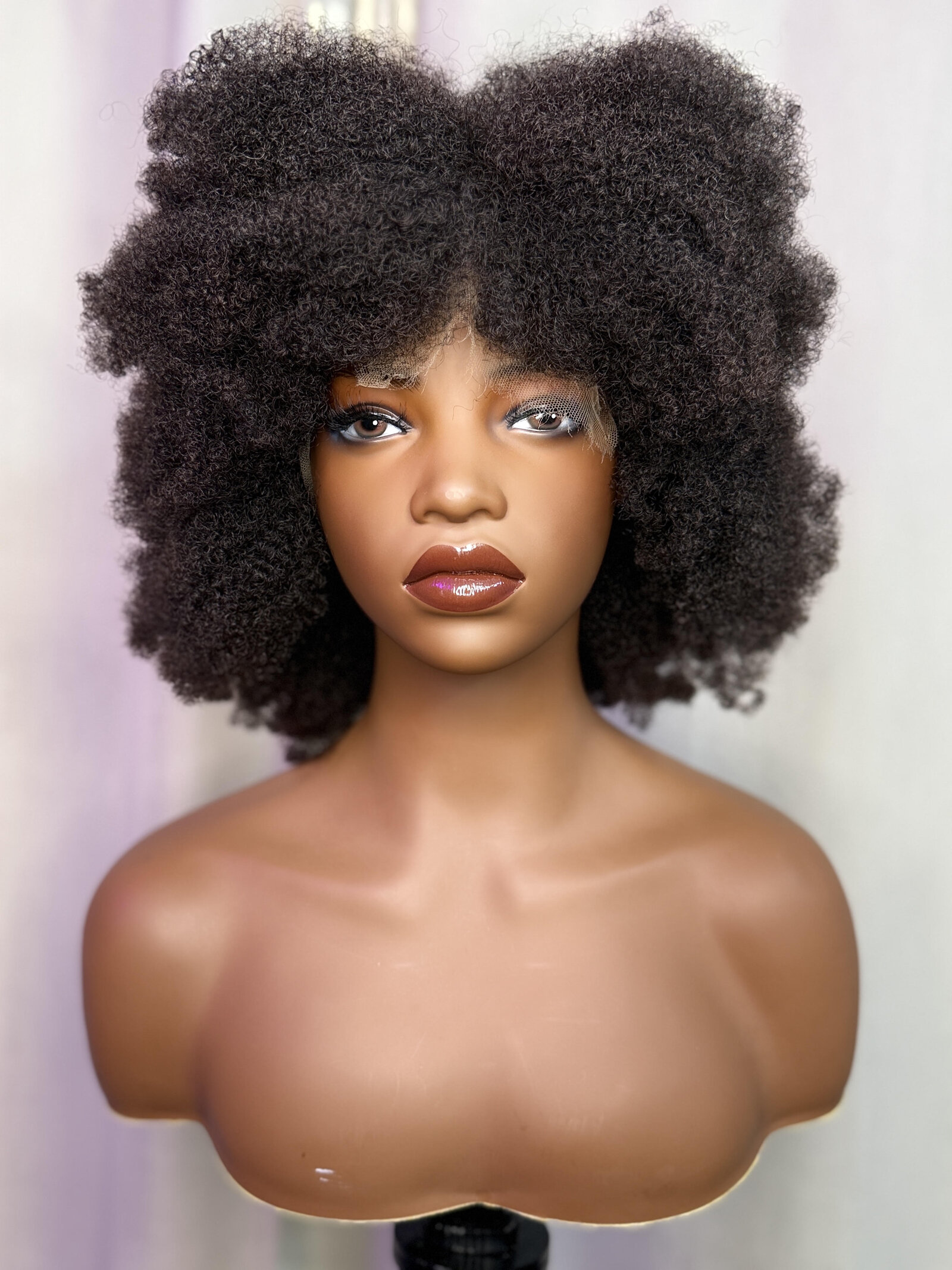 The Jean — a custom cranial prosthesis in a full natural 4C afro texture, handmade in the Arlington, VA studio